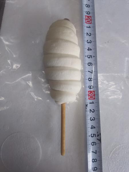 あらびきポークソーセージまん（串付）